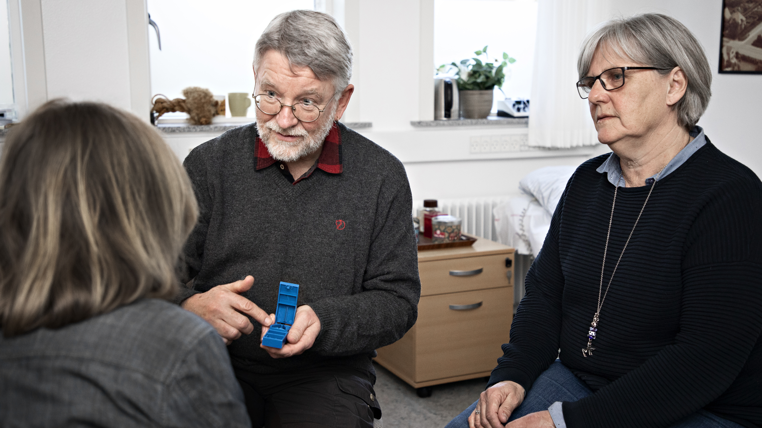 Samtale mellem tre personer